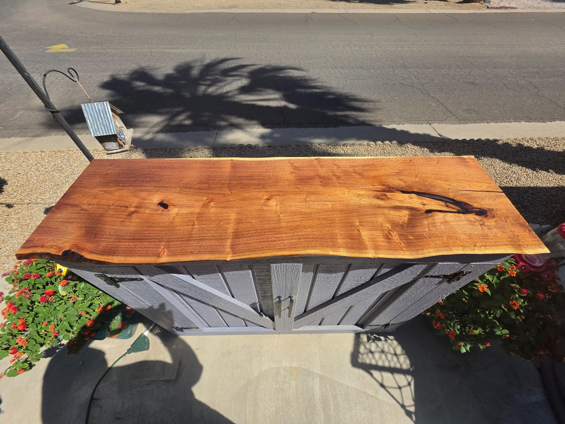 Finished wood top and gray cabinet
